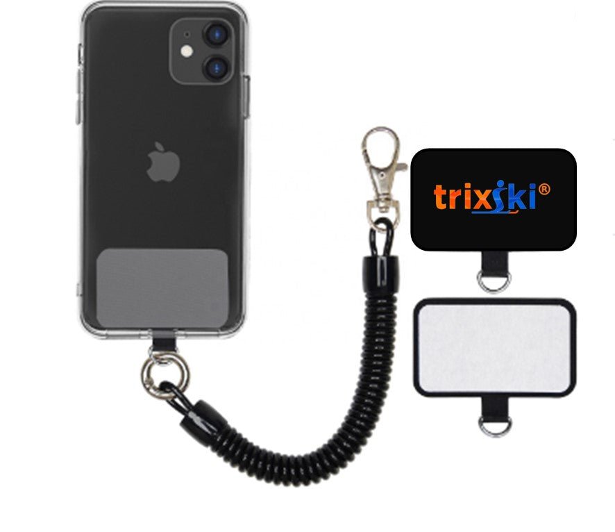 trixski PhoneSafe pack components: phone bungee and two sticky pads with D-ring. One pad shows trixski logo on the back.