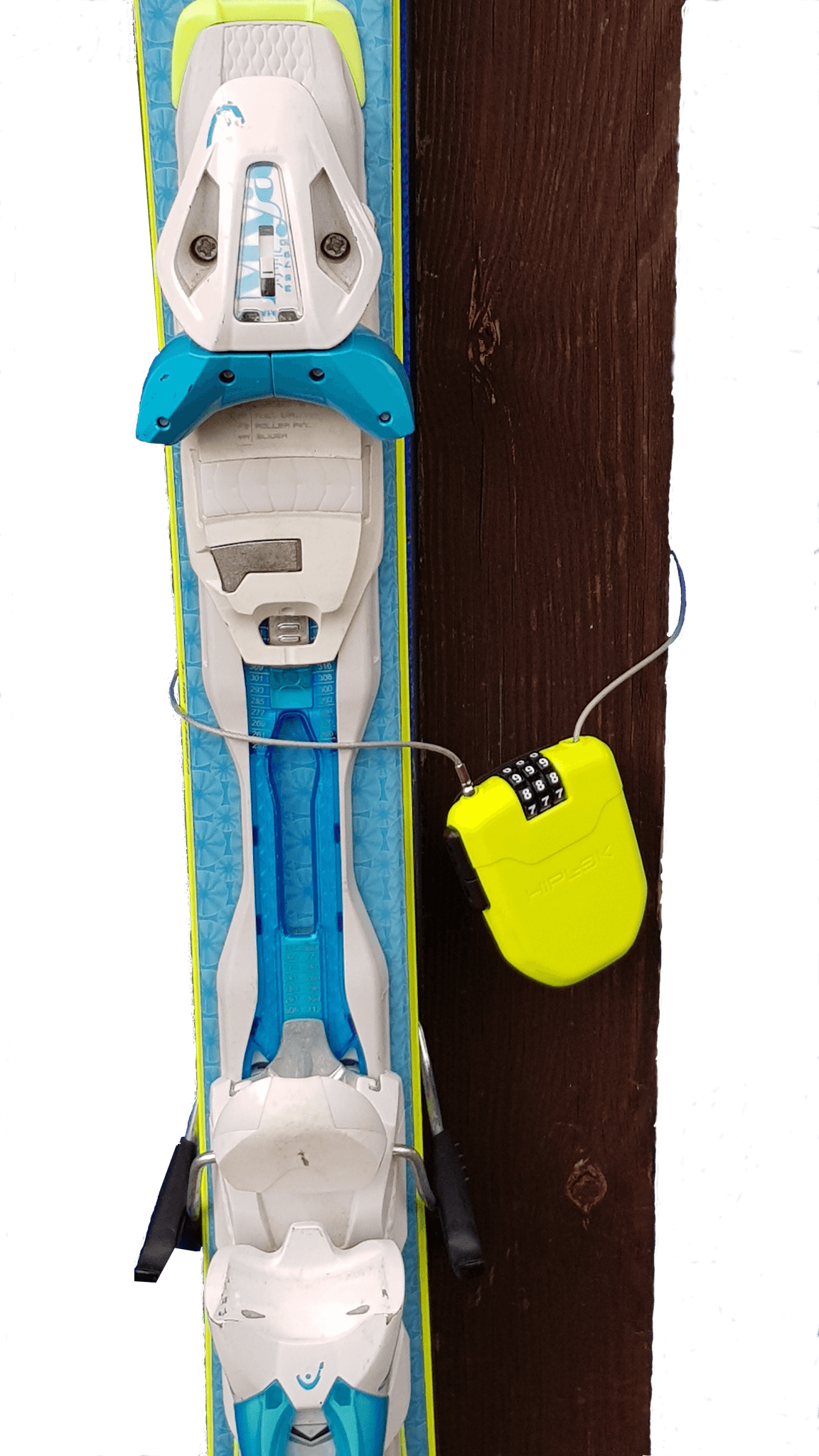 Vertical post with lime combination lock holding skis securely to the post via retractable wire