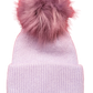 Lavender knitted hat with deep welt and puce faux fur pom pom