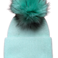 Showing Mint green hat  with dark mint/black tipped fur pom pom