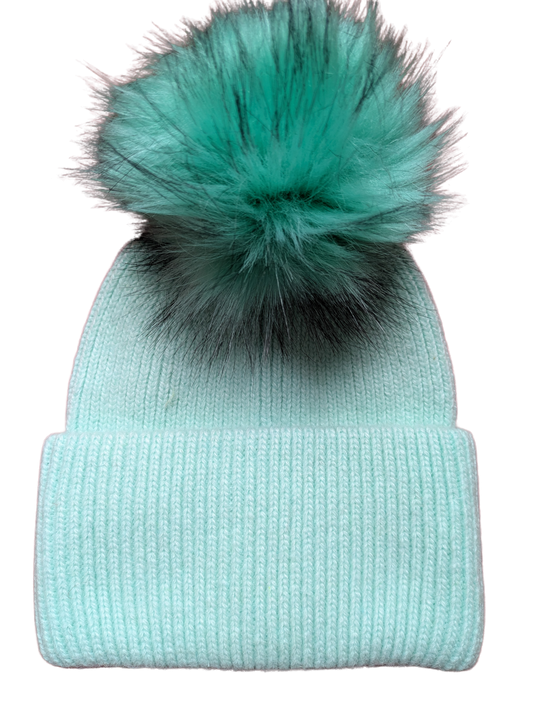 Showing Mint green hat  with dark mint/black tipped fur pom pom