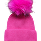 Deep rose knitted hat with deep welt and deep rose faux fur pom pom