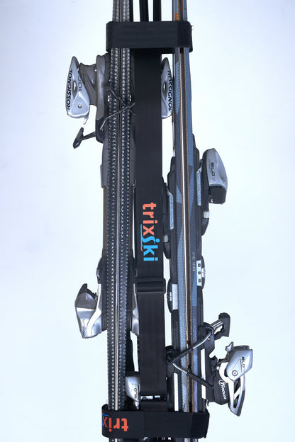 trixski ski carrier, with extension kit attached, being used to illustrate that two pairs of skis can be carried together